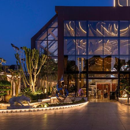 Mirage Hotel & Conference Center อเล็กซานเดรีย ภายนอก รูปภาพ The entrance of the hotel