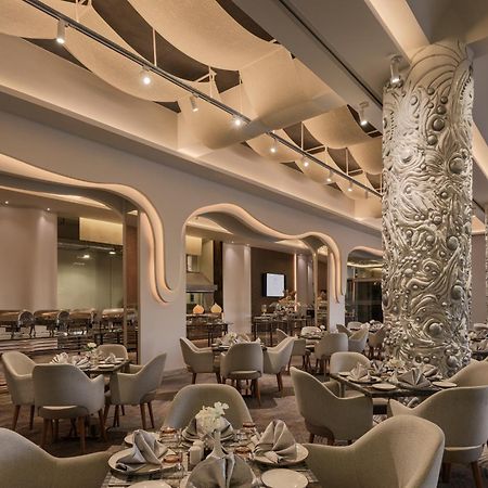 Mirage Hotel & Conference Center อเล็กซานเดรีย ภายนอก รูปภาพ The restaurant