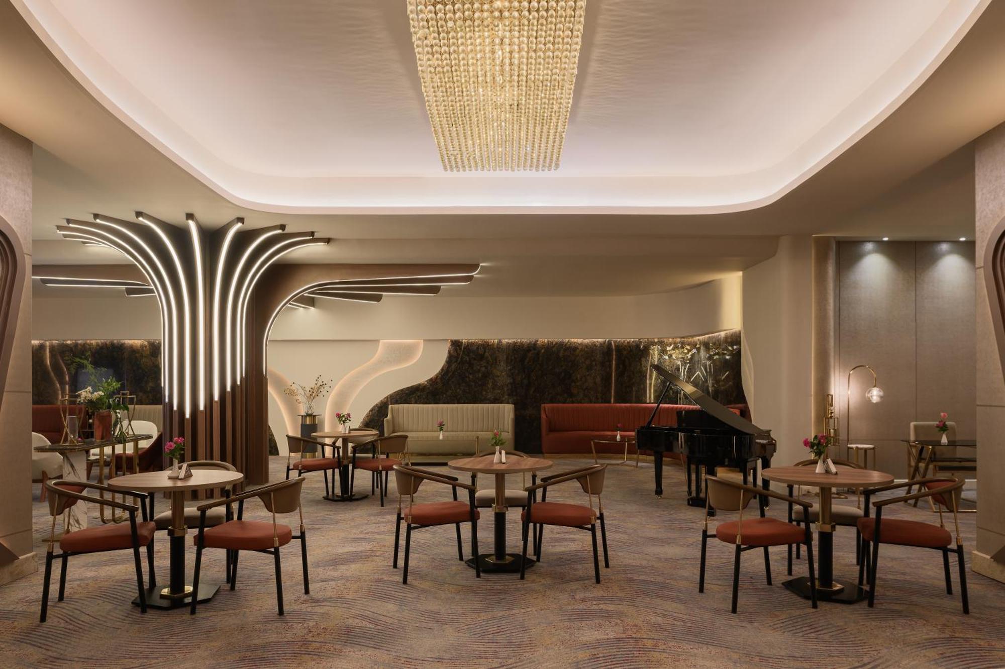 Mirage Hotel & Conference Center อเล็กซานเดรีย ภายนอก รูปภาพ The interior of the restaurant